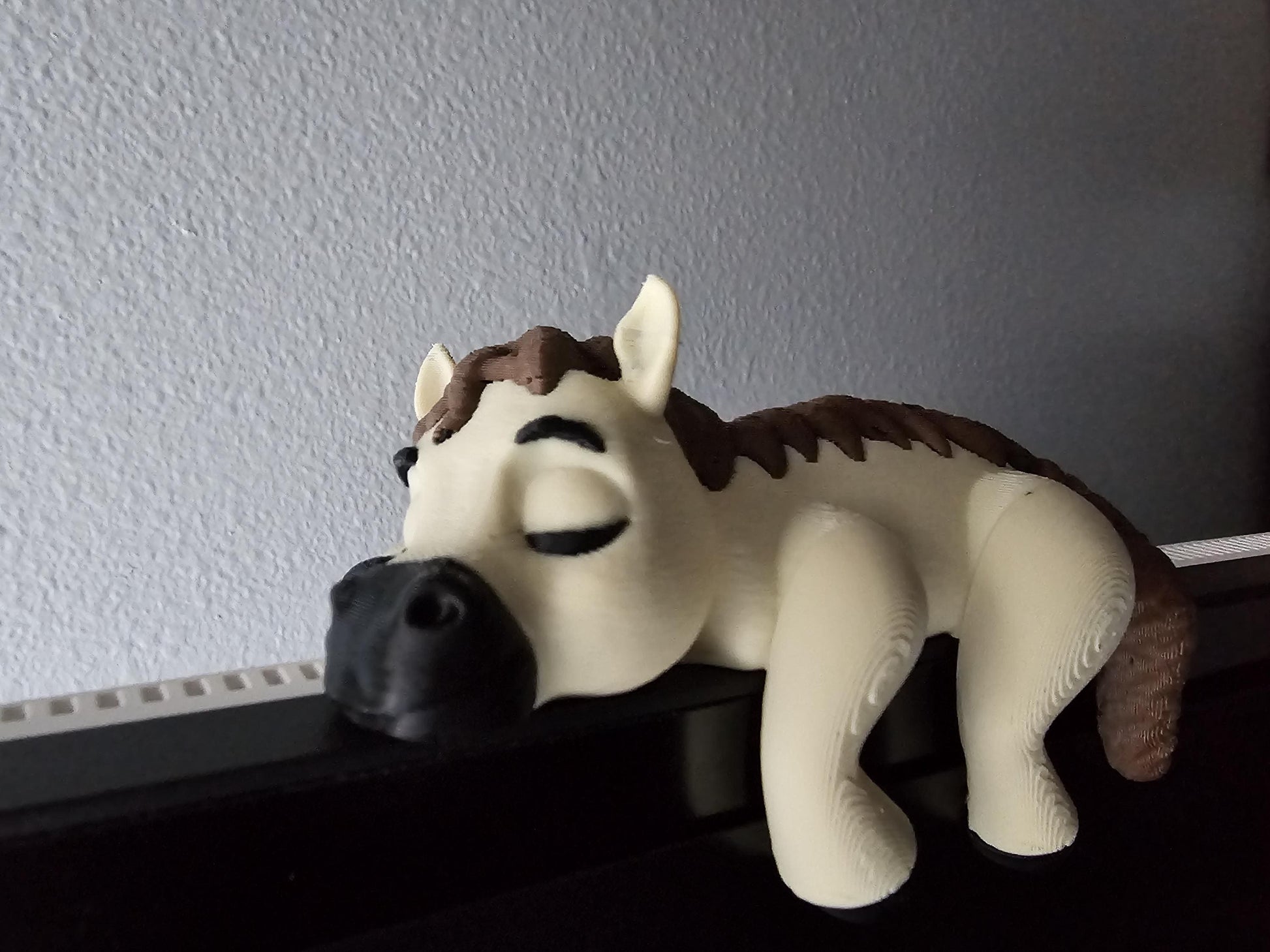 3D Printed Sleeping Horse Shelf Sitter: Unique Desk Decor